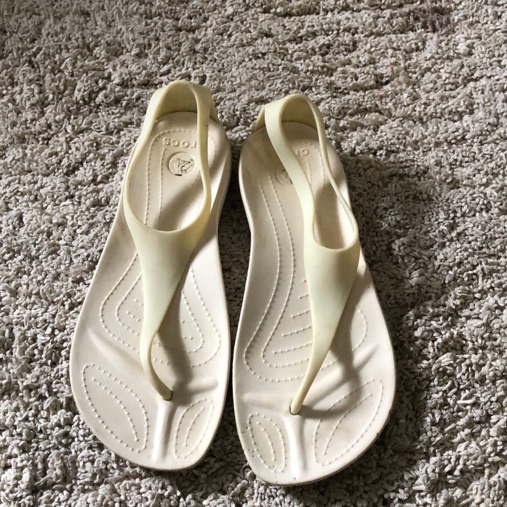 White/ off white crocs flip flop sandals